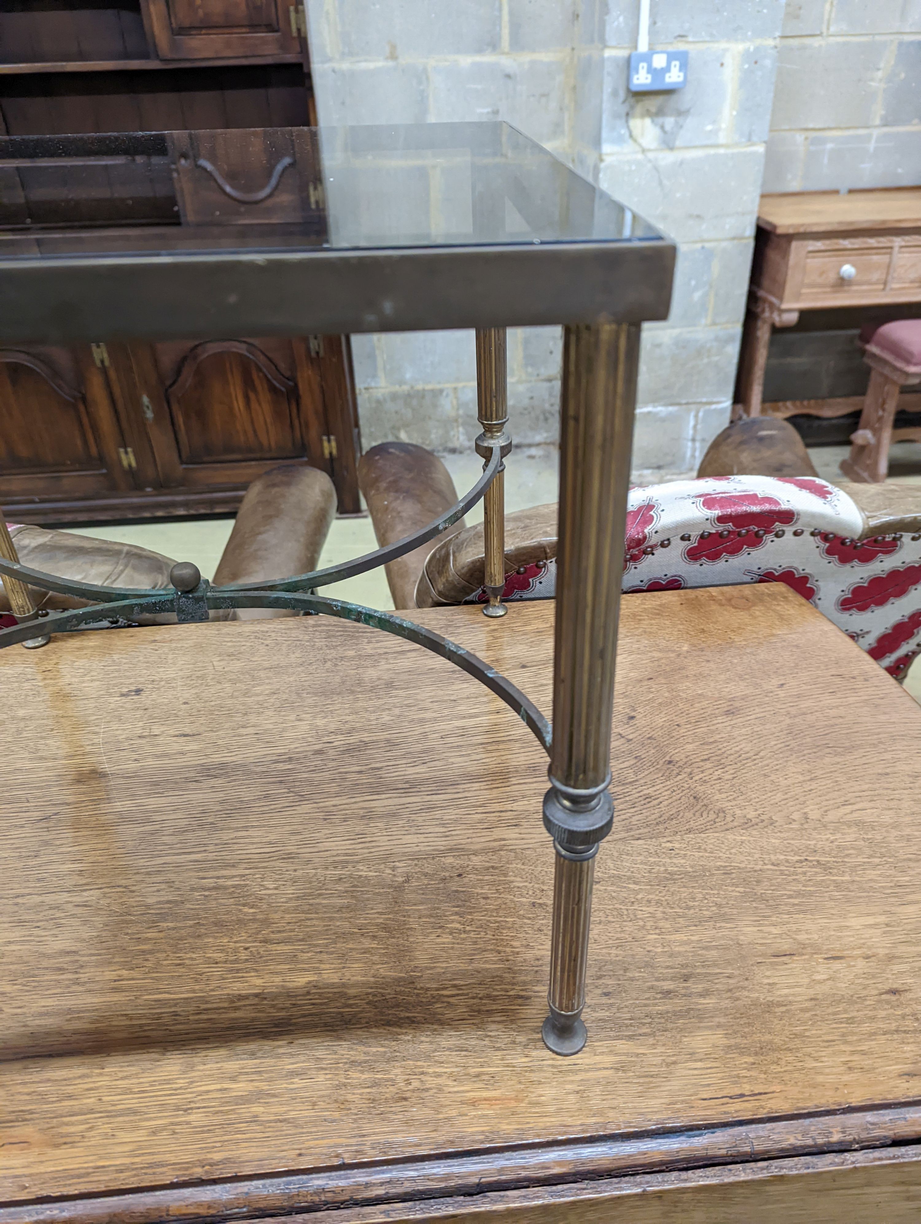 A Maison Jansen style glass and brass square occasional table. W-47cm, D-47cm, H-41cm.